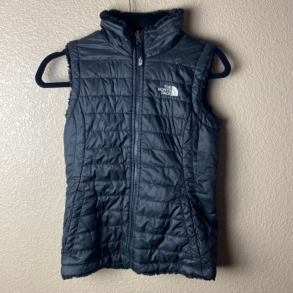 Reversible The North Face puffer vest.